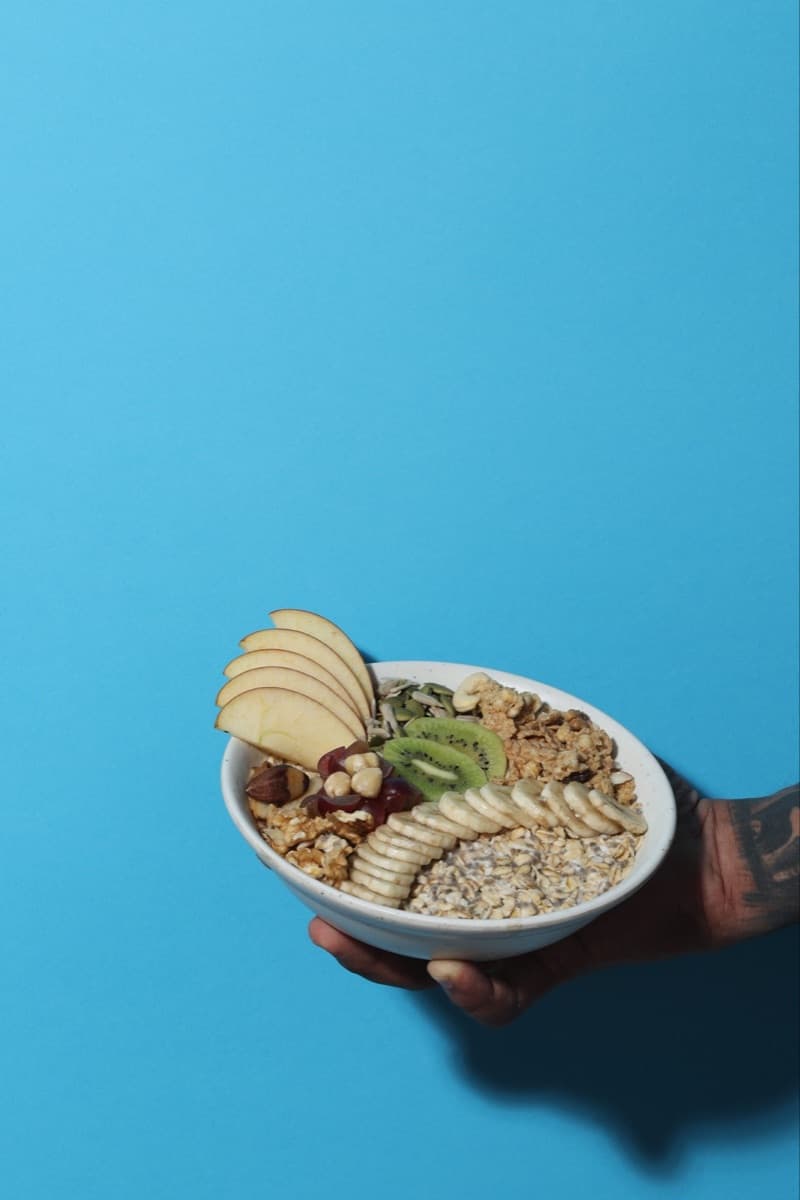 A fresh oatmeal bowl being served
